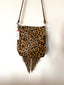 Leopard Fringe Leather Crossbody Bag with tooled flowers